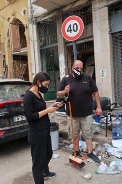 IRC volunteer and communication manager outside in Beirut.