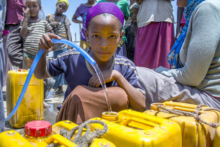 Shita Serbela collects water in Ethiopia.