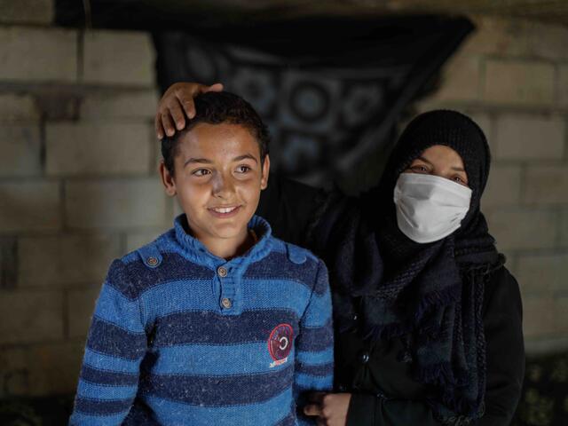 10-year-old Tareq and his mother Muna.