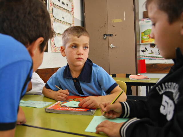 Refugee boy at IRC healing classroom West Bank