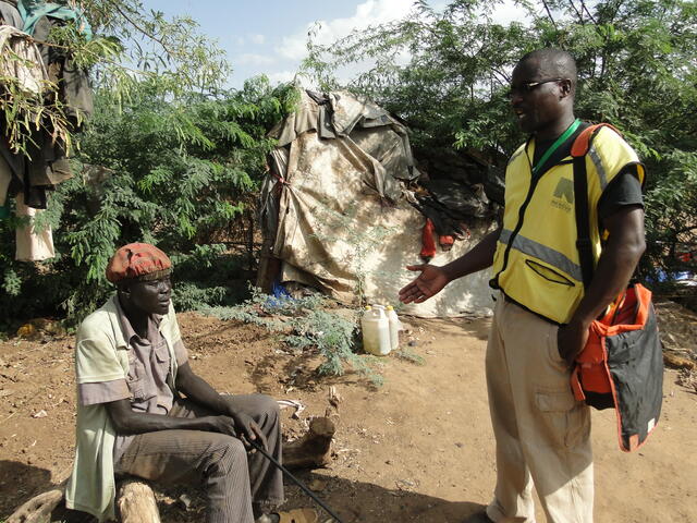 Daniel with IRC mental health officer Alex at Kakuma