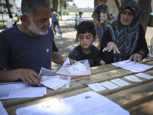 Family prepare their relocation application to Germany