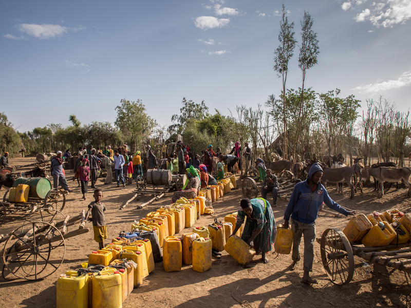 Ethiopia water point People line up to collect water