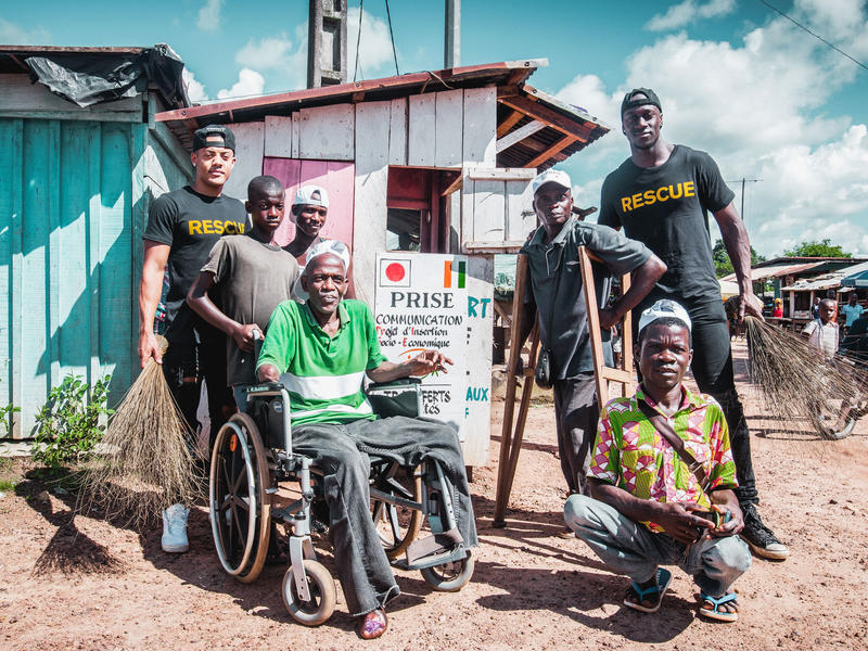 Nico & Vinz with three Ivorian men living with with disabilities 