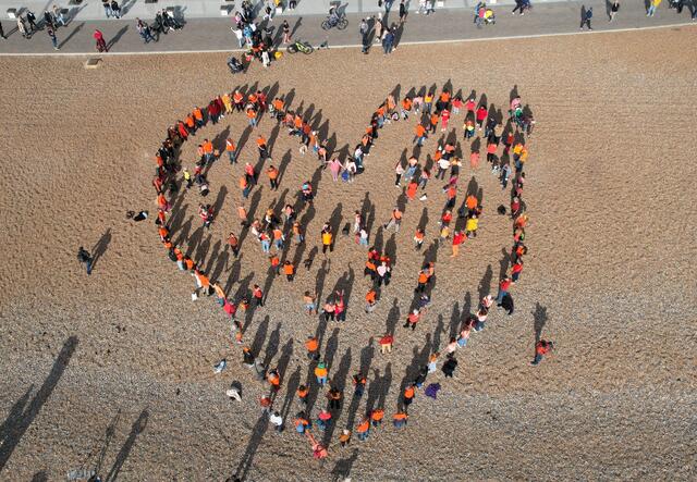 In Brighton, Together with Refugees met on Brighton Beach to create a giant orange heart, spreading the message that refugees are welcome in the UK. 