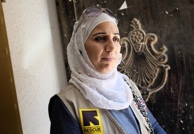 37-year-old Amira volunteers at a health clinic