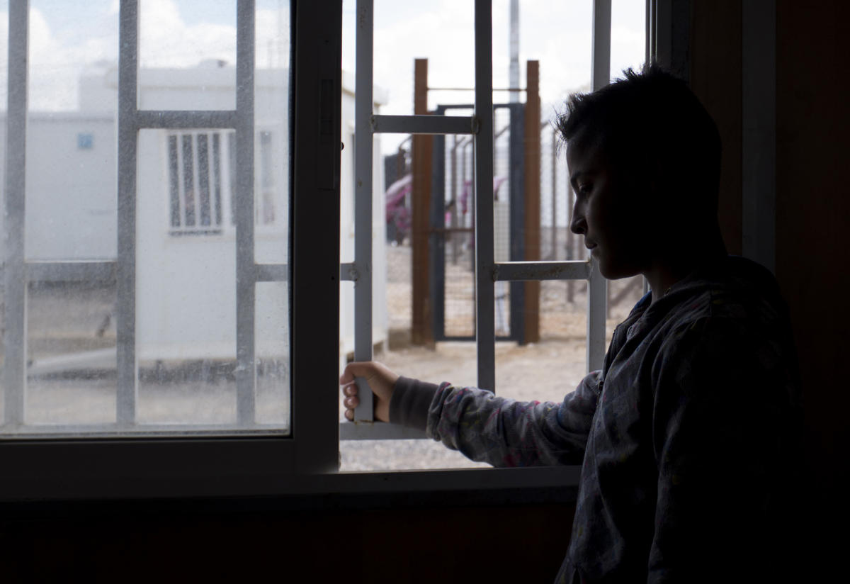 Fifteen-year-old Samir* has been waiting for four months in Jordan’s Azraq refugee camp to be reunited with his family. Fifteen-year-old Samir* has been waiting for four months in Jordan’s Azraq refugee camp to be reunited with his family.