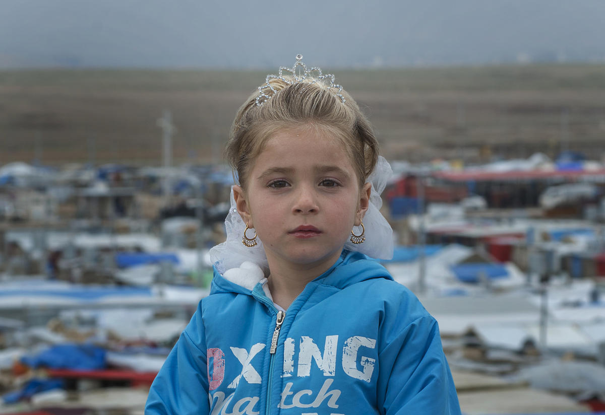 A young girl in Iraq's Domiz refugee camp for Syrian refugees A young girl in Iraq's Domiz refugee camp for Syrian refugees