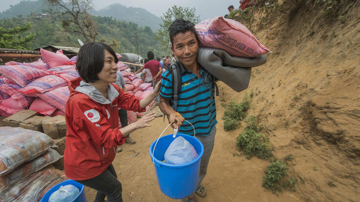 Aid workers distributing rice.